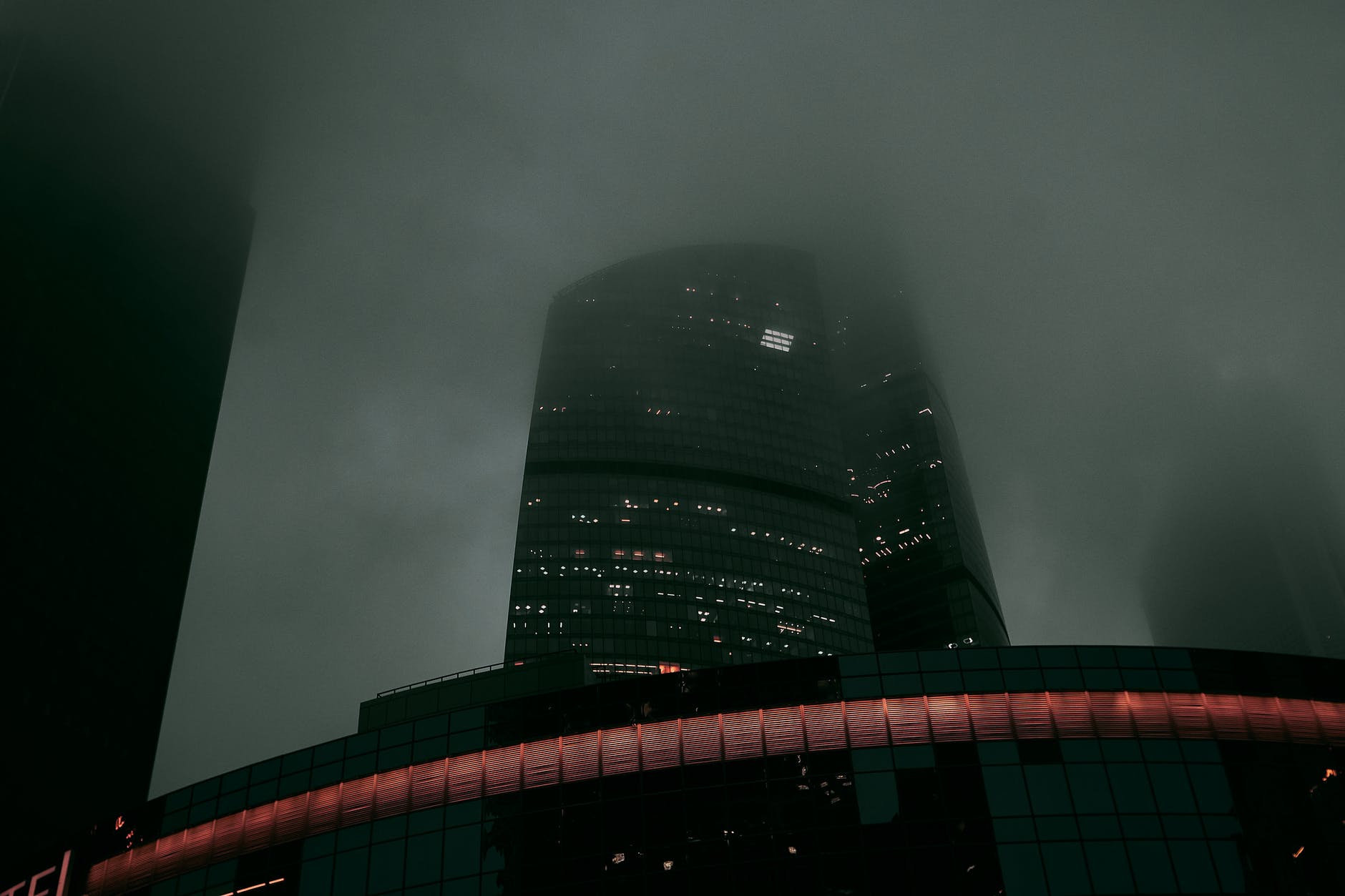 spooky fog covering high rise skyscrapers