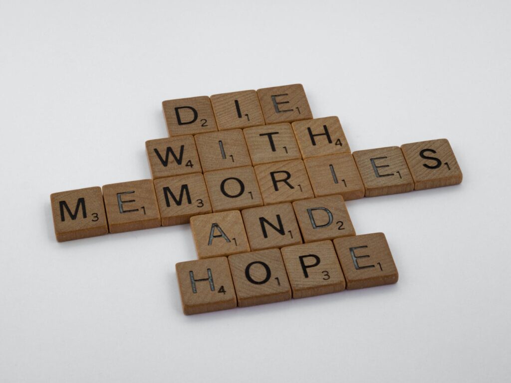 brown wooden scrabble tiles on white table