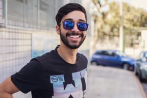 close up photography of man wearing sunglasses